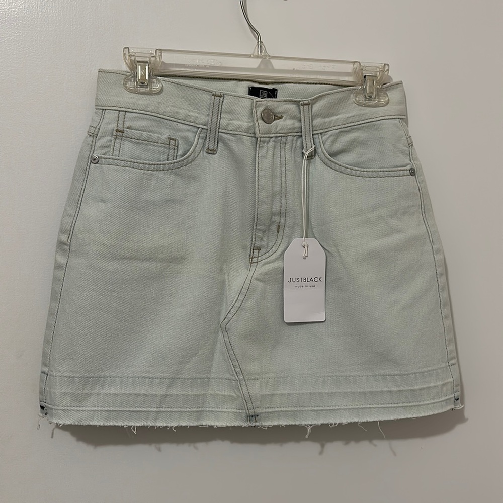 Light wash denim skirt. Never worn!!